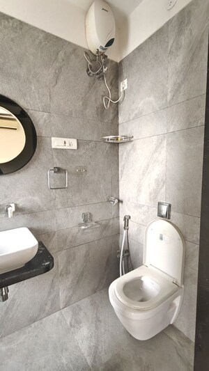 Bathroom in 2 BHK Apartment at Dheeraj Uphar CHS. LTD., Malad East – for Rent