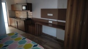 Kitchen in Studio Apartment at Paramount Golfforeste, Zeta I Greater Noida – for Rent
