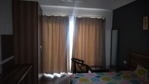 Living Room in Studio Apartment at Paramount Golfforeste, Zeta I Greater Noida – for Rent