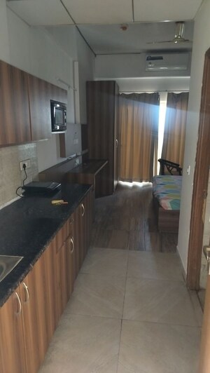 Kitchen in Studio Apartment at Paramount Golfforeste, Zeta I Greater Noida – for Rent