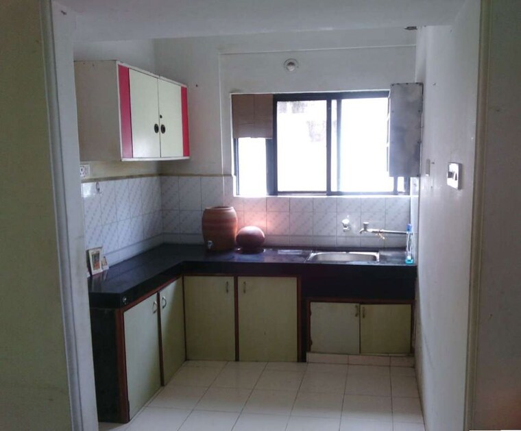 Kitchen, sarala-roses 1.5 Bedroom 605 Sq.Ft. Apartment In Baner Pune 10691634