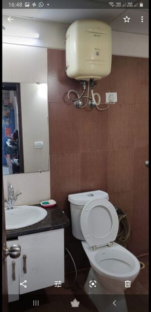 Bathroom in 3 BHK Apartment at Mahagun Moderne, Sector 78 – for Sale