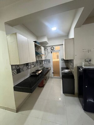 Kitchen in 2 BHK Apartment at Signature The Serenas, Sohna Sector 36 – for Rent
