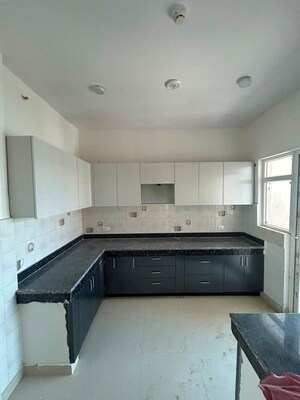 Kitchen in  Apartment at Mahagun My Woods, Sector 16c Greater Noida – for Rent