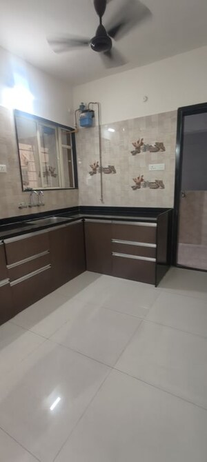 Kitchen in 2 BHK Apartment at GK Rose Icon, Pimple Saudagar – for Rent