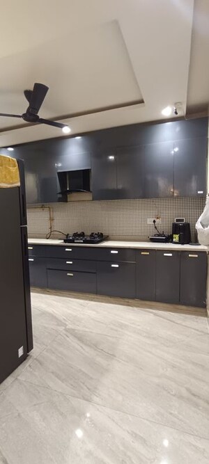 Kitchen in 3 BHK Builder Floor at Puri Aman Vilas, Sector 89 – for Sale