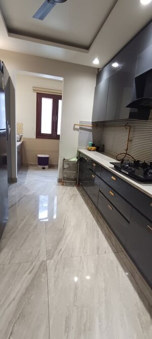 Kitchen in 3 BHK Builder Floor at Puri Aman Vilas, Sector 89 – for Sale