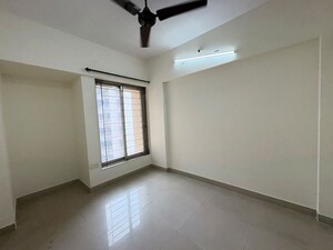 Room in 2.5 BHK Apartment at Kanakia Spaces Niharika, Manpada – for Sale