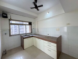 Kitchen in 2.5 BHK Apartment at Kanakia Spaces Niharika, Manpada – for Sale