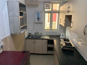 Kitchen in 3 BHK Apartment at Supertech Cape Town, Sector 74 – for Rent