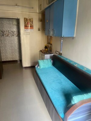 Living Room in 2 BHK Apartment at Tilak Shanti CHS, Tilak Nagar – for Rent