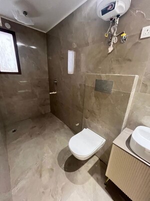 Bathroom in 3 BHK Builder Floor at Freedom Fighters Enclave – for Rent