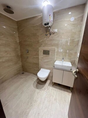 Bathroom in 3 BHK Builder Floor at Freedom Fighters Enclave – for Rent