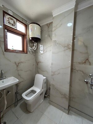 Bathroom in 3 BHK Builder Floor at Freedom Fighters Enclave – for Rent