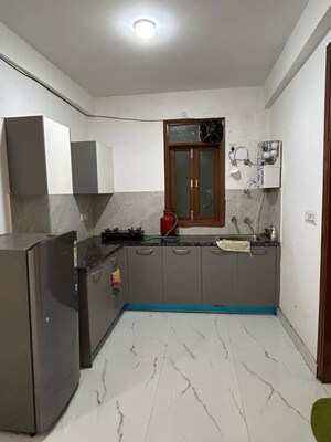 Kitchen in 3 BHK Builder Floor at Freedom Fighters Enclave – for Rent