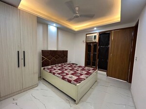 Bedroom in 3 BHK Builder Floor at Freedom Fighters Enclave – for Rent