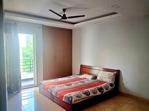 Bedroom in 4 BHK Builder Floor at Ansal API Esencia, Sector 67 – for Rent