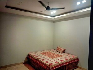 Bedroom in 4 BHK Builder Floor at Ansal API Esencia, Sector 67 – for Rent