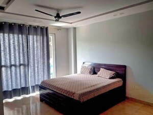 Bedroom in 4 BHK Builder Floor at Ansal API Esencia, Sector 67 – for Rent