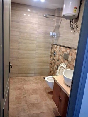 Bathroom in 4 BHK Builder Floor at Ansal API Esencia, Sector 67 – for Rent
