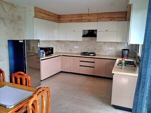 Kitchen in 4 BHK Builder Floor at Ansal API Esencia, Sector 67 – for Rent