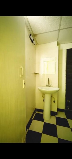 Bathroom in 2 BHK Apartment at Meenal Balmukund Residency, Raj Nagar Extension – for Sale