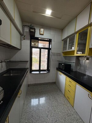 Kitchen in 2 BHK Apartment at Parimal Heights, Juhu – for Rent