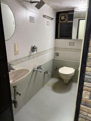 Bathroom in 2 BHK Apartment at Parimal Heights, Juhu – for Rent