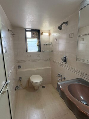 Bathroom in 2 BHK Apartment at Parimal Heights, Juhu – for Rent