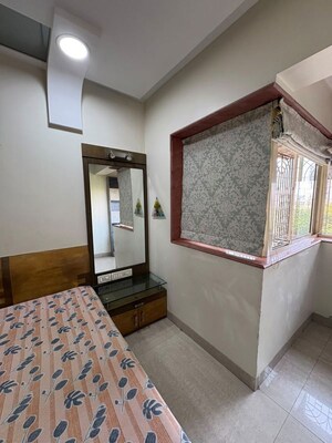 Bedroom in 2 BHK Apartment at Parimal Heights, Juhu – for Rent
