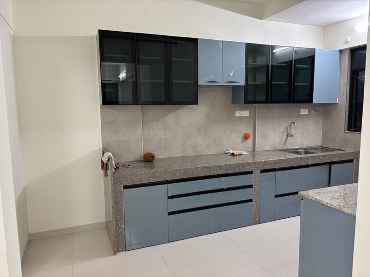 Kitchen, kumar-47-east-a 2 Bedroom 900 Sq.Ft. Apartment In Magarpatta City Pune 10692591
