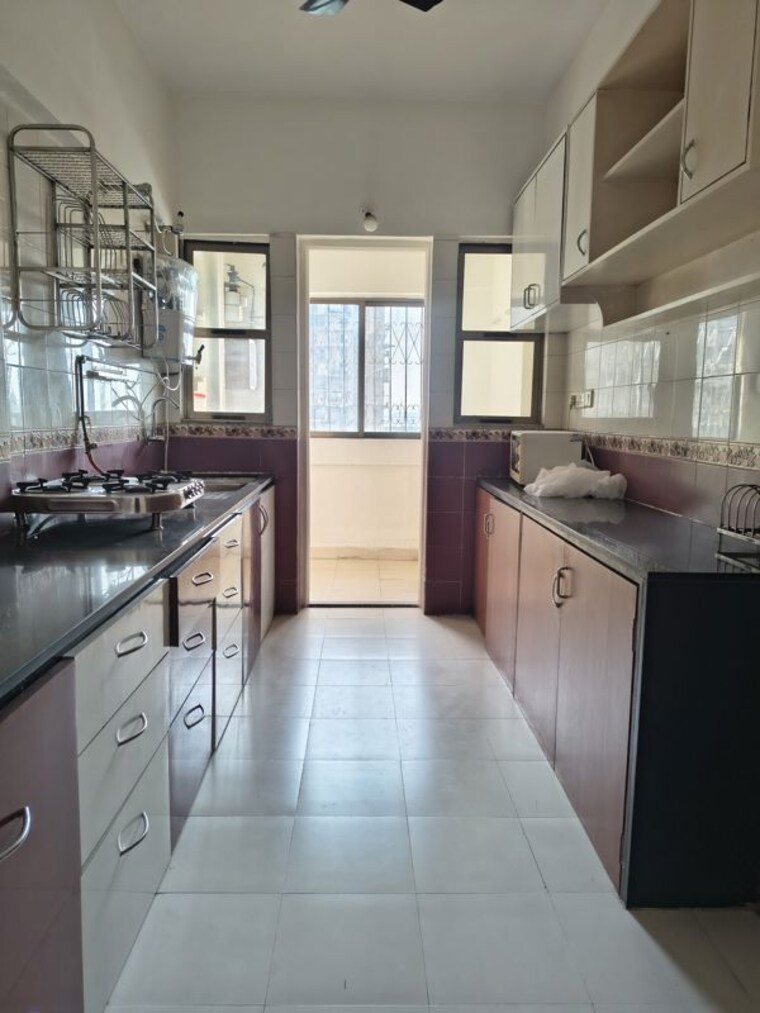 Kitchen, nri-complex-phase-2 2 Bedroom 1250 Sq.Ft. Apartment In Seawoods Navi Mumbai 10692601