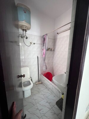 Bathroom in 3 BHK Builder Floor at Ansal Sushant Lok I, Sector 43 – for Rent