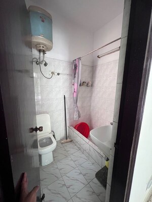 Bathroom in 3 BHK Builder Floor at Ansal Sushant Lok I, Sector 43 – for Rent