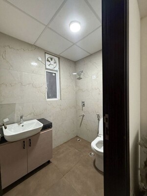 Bathroom in 3.5 BHK Apartment at Smart World Gems, Sector 89 – for Sale