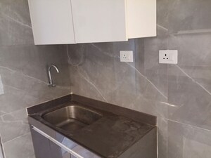 Kitchen in 2 BHK Apartment at Aristone Vasudev Paradise, Mira Road – for Rent