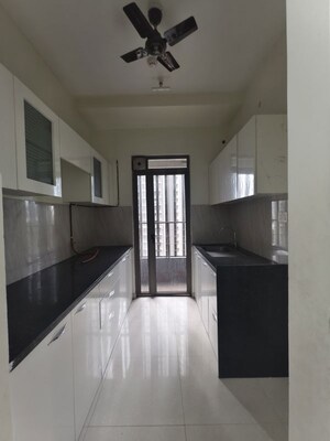 Kitchen in 2 BHK Apartment at Kalpataru Paramount, Kapur Bawdi – for Rent
