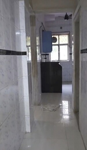 Bathroom in 1 BHK Apartment at Shaheed Bhagat Singh CHS, Andheri East – for Rent