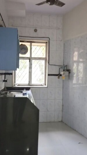 Kitchen in 1 BHK Apartment at Shaheed Bhagat Singh CHS, Andheri East – for Rent