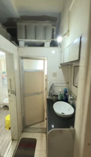 Bathroom in 1 BHK Apartment at Andheri Heights, Andheri East – for Rent