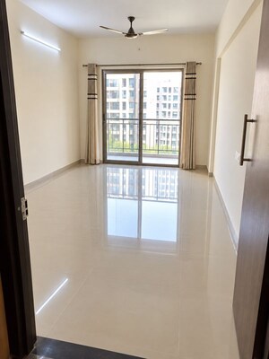 Living Room in 1 BHK Apartment at Rustomjee Avenue L1, Virar West – for Sale