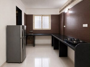 Kitchen in 3 BHK Apartment at Sukhwani Elmwood, Pimple Saudagar – for Rent