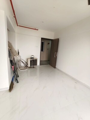 Living Room in 1 BHK Apartment at Metropolis Bayside, Kasarvadavali – for Rent