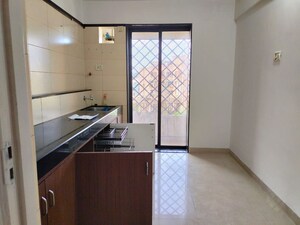 Kitchen in 2 BHK Apartment at Swapnalok Towers, Malad East – for Rent