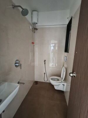 Bathroom in 2 BHK Apartment at Shreeji Plaza, Malad West – for Rent