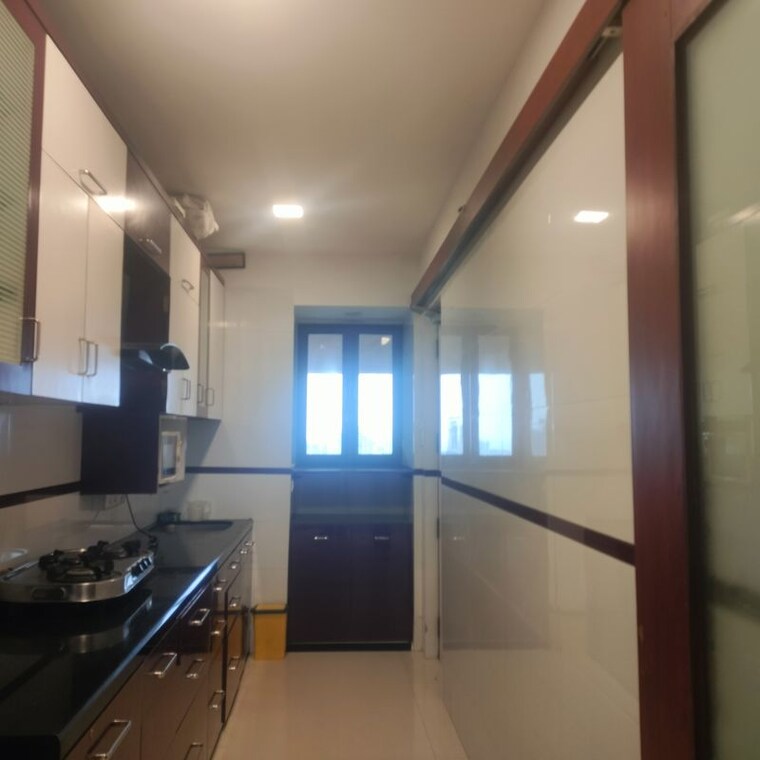 Kitchen, oberoi-sky-gardens 3 Bedroom 2700 Sq.Ft. Apartment In Andheri West Mumbai 10692908