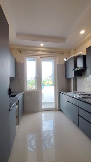 Kitchen in 3 BHK Builder Floor at Ansal API Esencia, Sector 67 – for Rent