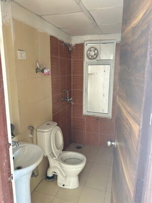 Bathroom in  Apartment at Mahagun My Woods, Sector 16c Greater Noida – for Rent