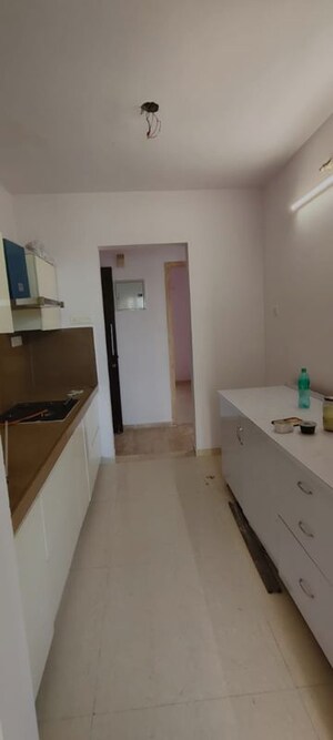 Kitchen in 2.5 BHK Apartment at Puranik Rumah Bali, Ghodbunder Road – for Rent