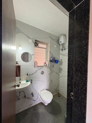 Bathroom in 1 BHK Apartment at Raunak Bliss, Ghodbunder Road – for Rent